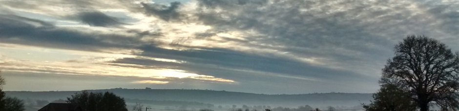 Wintry sky behind Belview Cottage Dorset
